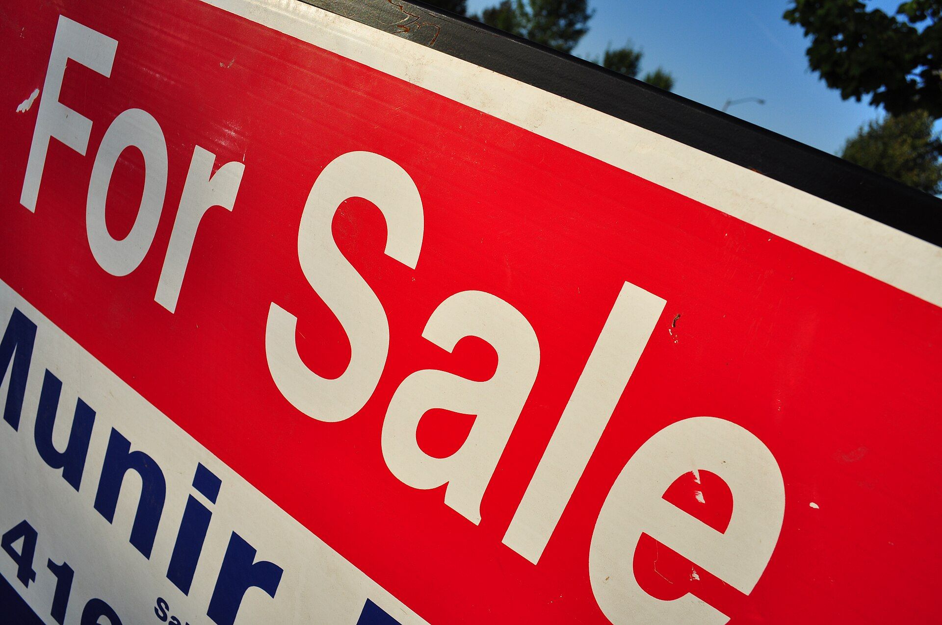 Single-family home in northern New Jersey with for-sale sign